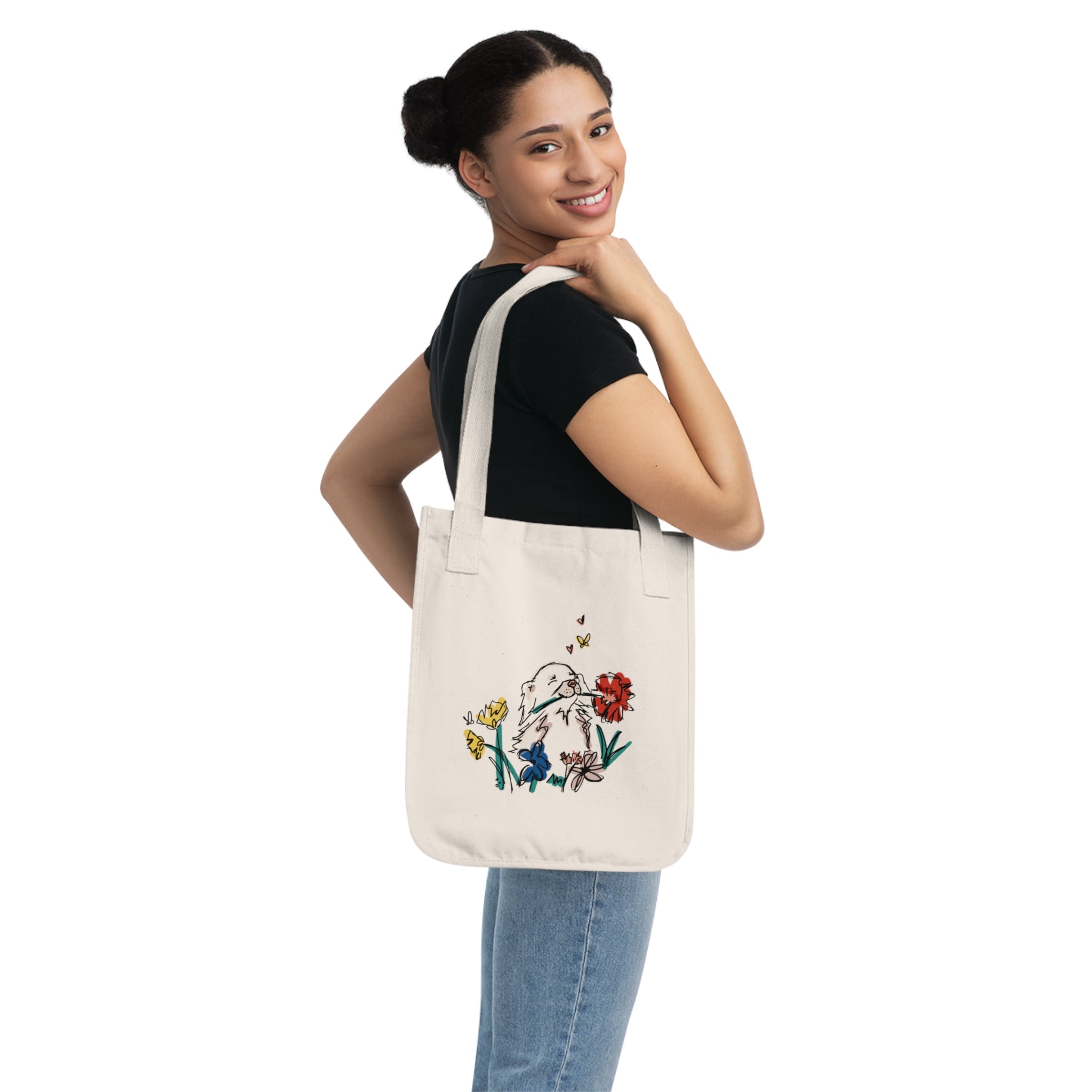 small dog sketch with flowers on an organic cotton tote bag - woman using the bag - 100 organic cotton Canvas Tote Bag at sleepy chi. - sustainable ecofriendly cute and unique gifts for dog owners